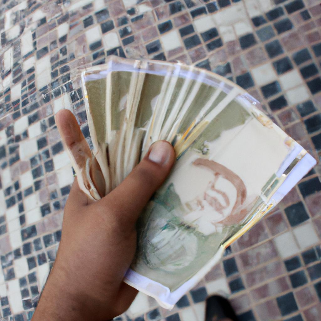 Person holding foreign currency notes